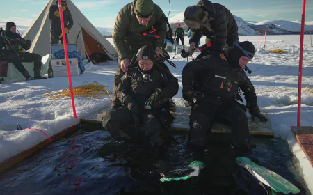 Scientists train to dive beneath polar ice as climate change warms the Arctic and Antarctica