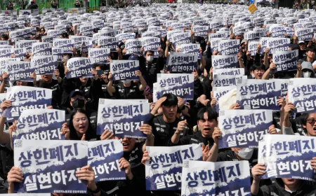 Samsung workers rally in South Korea, demanding higher pay and threatening to strike